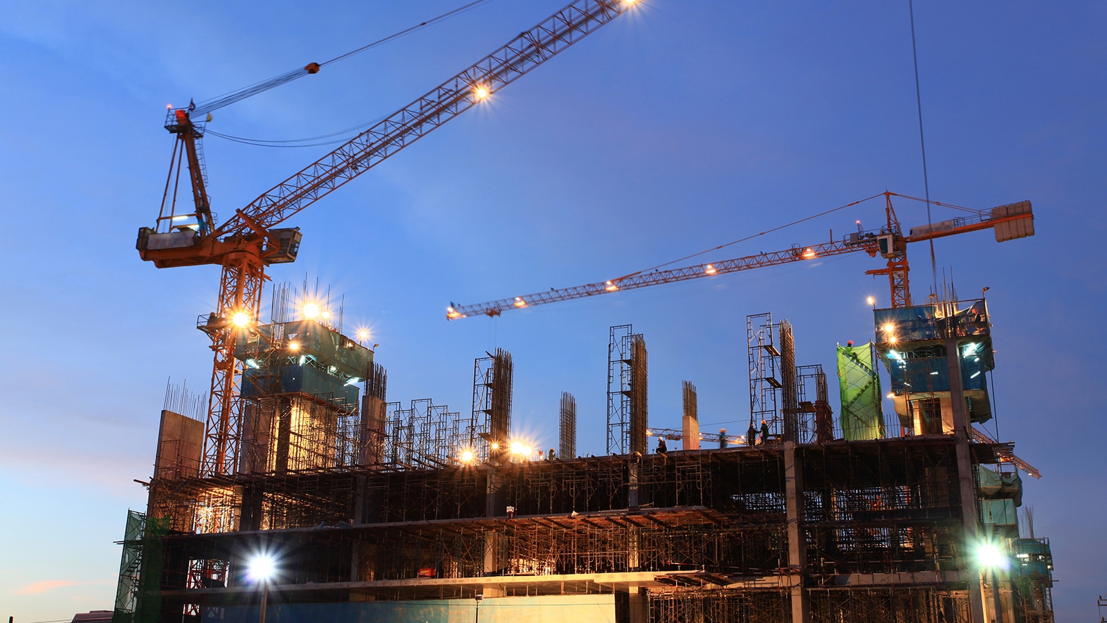 construction site at dusk Illustrasjonsbilde bygg og anlegg